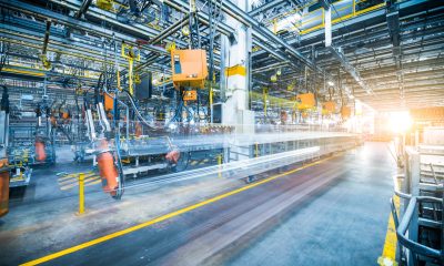 robots welding in a car factory